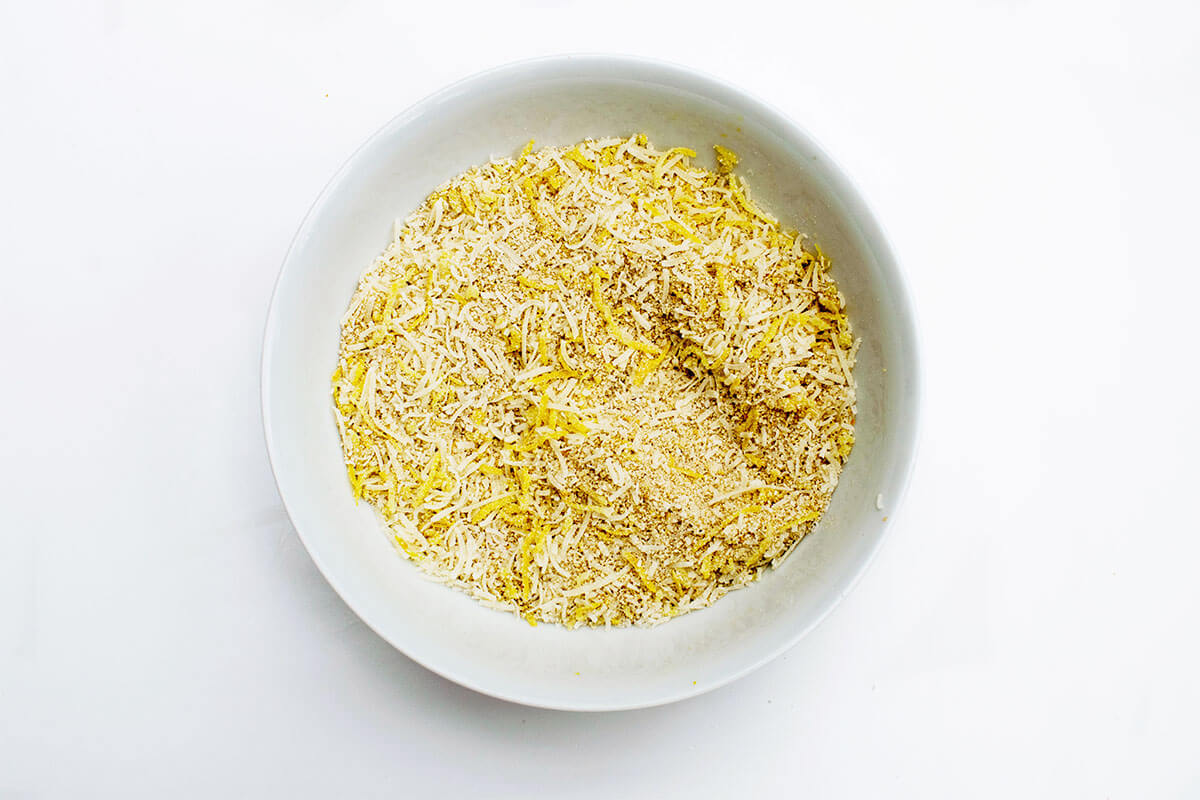 A bowl of breadcrumbs, cheese and lemon zest