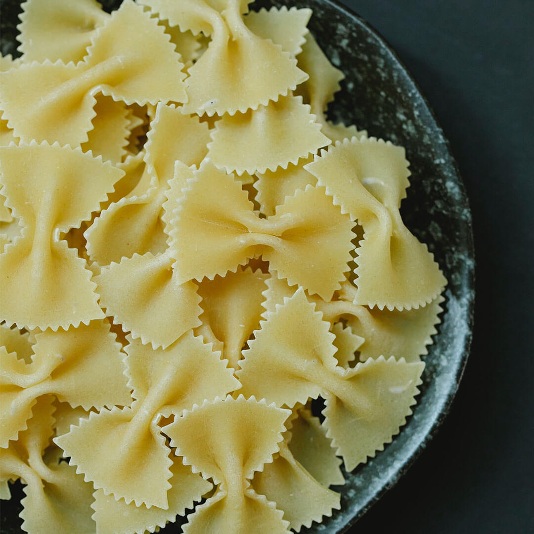 A plate of bowl shaped pasta