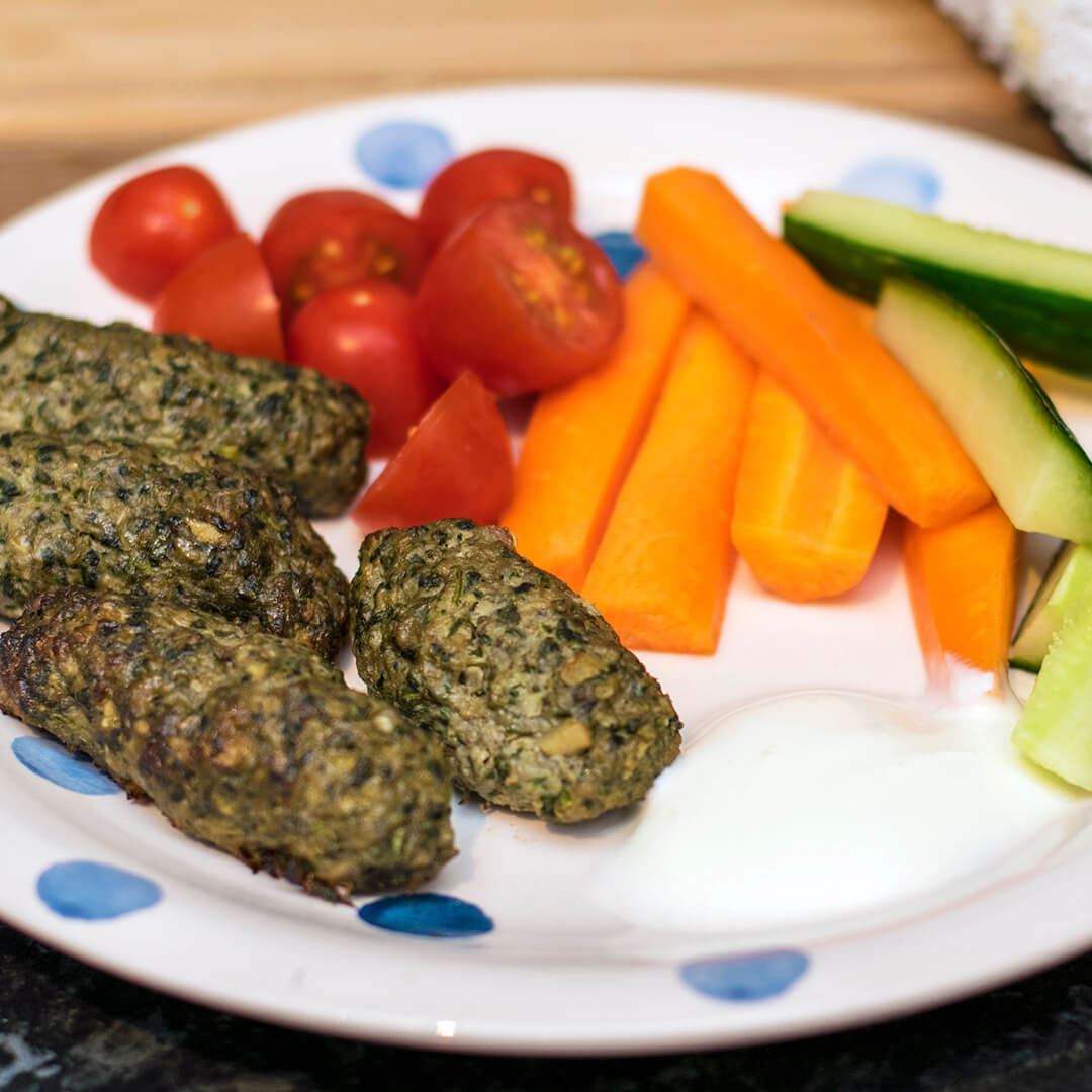 Lamb, Spinach &amp; Mushroom Koftas served with cherry tomatoes, cucumber and carrot sticks